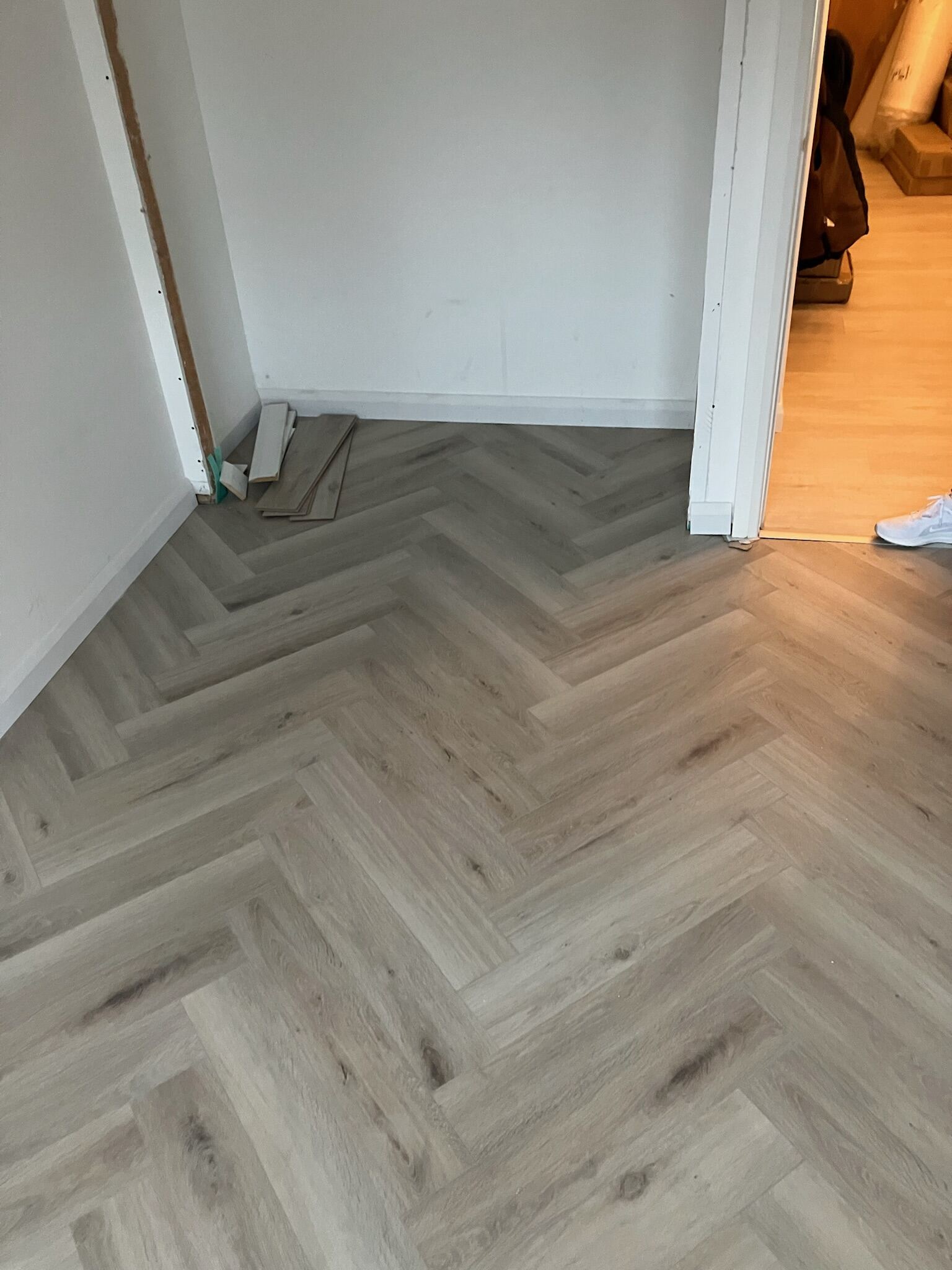 Herringbone LVT Bedroom Floor — gallery photo